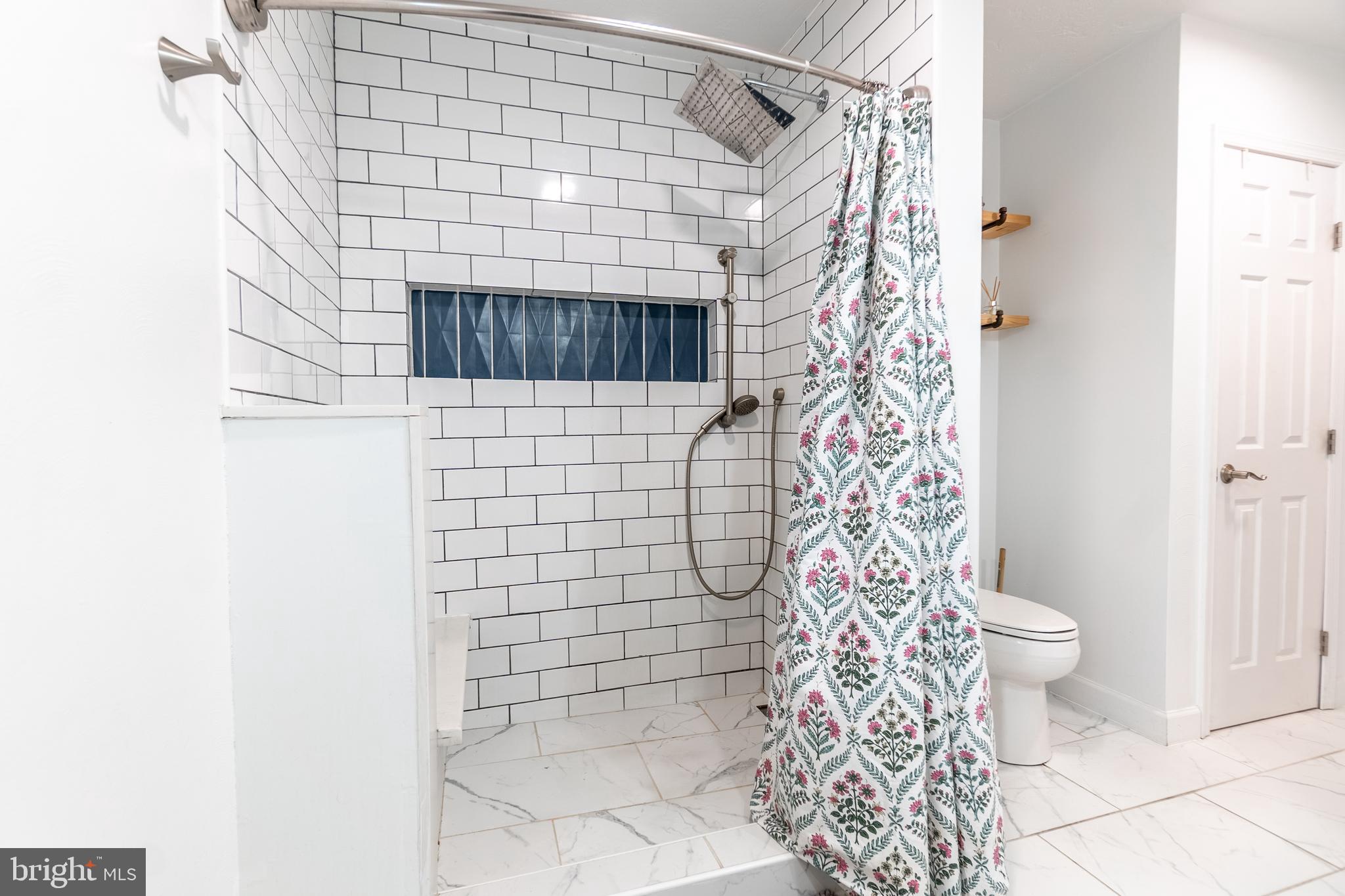 717 East Walnut Street Hanover, PA 17331 - Photo 10 of 21 a bathroom with a shower and a toilet