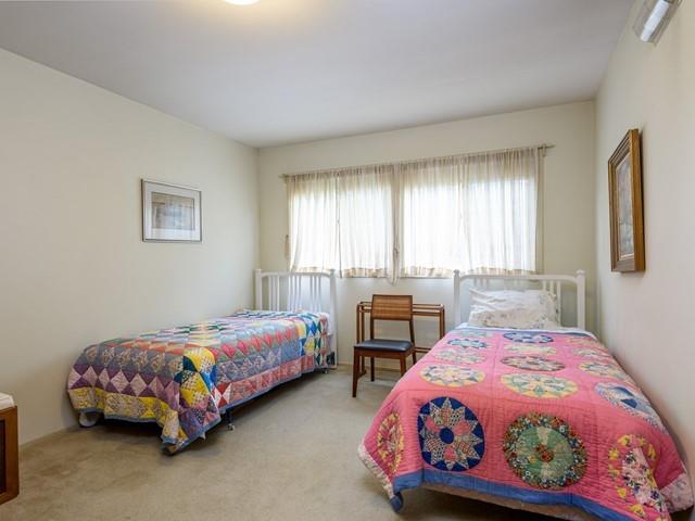 1049 Sycamore Drive Millbrae, CA 94030 - Photo 15 of 19 a bedroom with two beds and a table