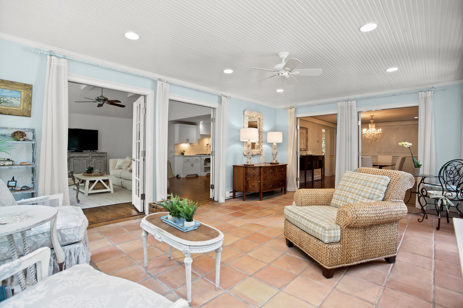 336 Hollow Tree Ridge Road Darien, CT 06820 - Photo 14 of 40 a living room with furniture and a flat screen tv