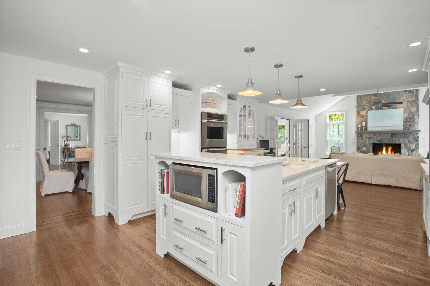 336 Hollow Tree Ridge Road Darien, CT 06820 - Photo 22 of 40 a view of kitchen with sink microwave and stove