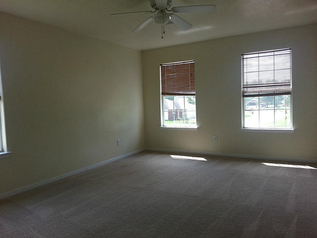 23319 Cape Cottage Court Spring, TX 77373 - Photo 20 of 23 an empty room with a window