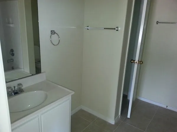 a view of a workspace with a chandelier fan
