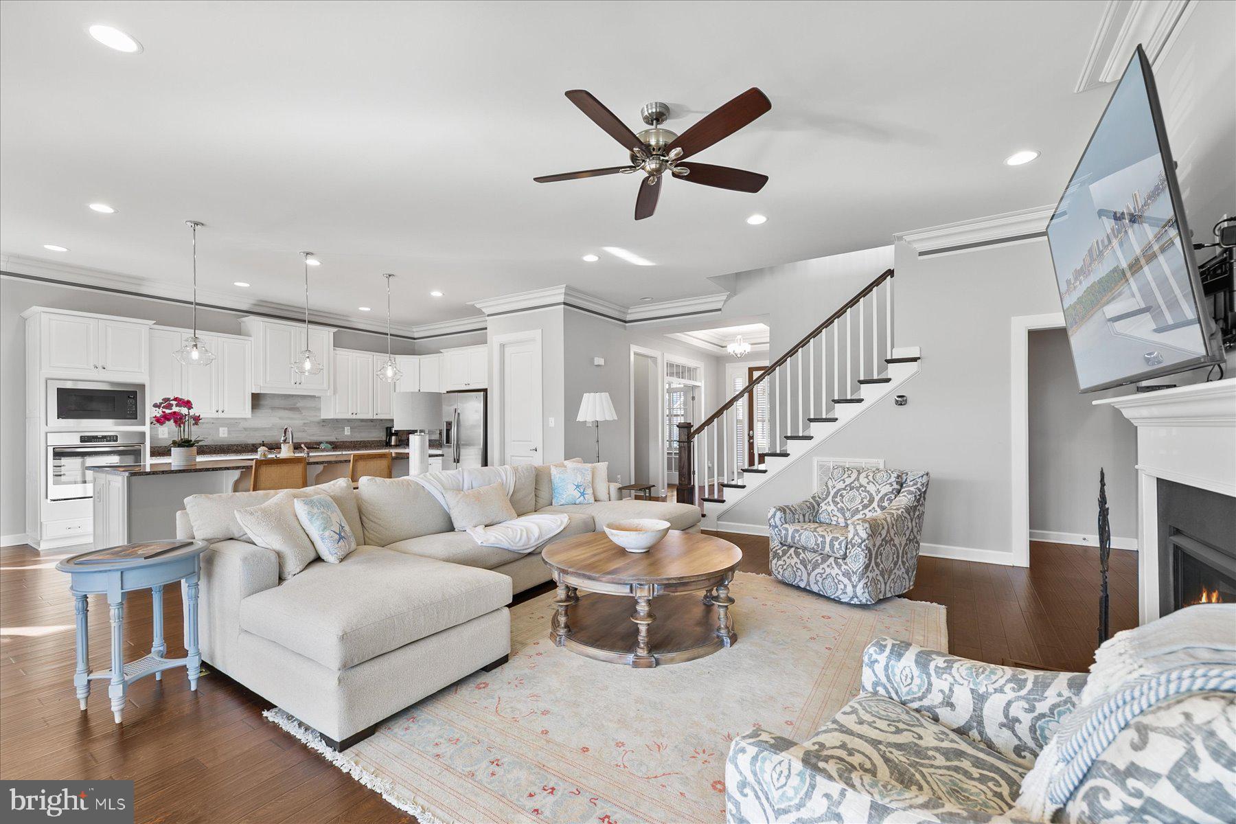 20822 Cormorant Way Ocean View, DE 19970 - Photo 20 of 91 a living room with furniture and kitchen view