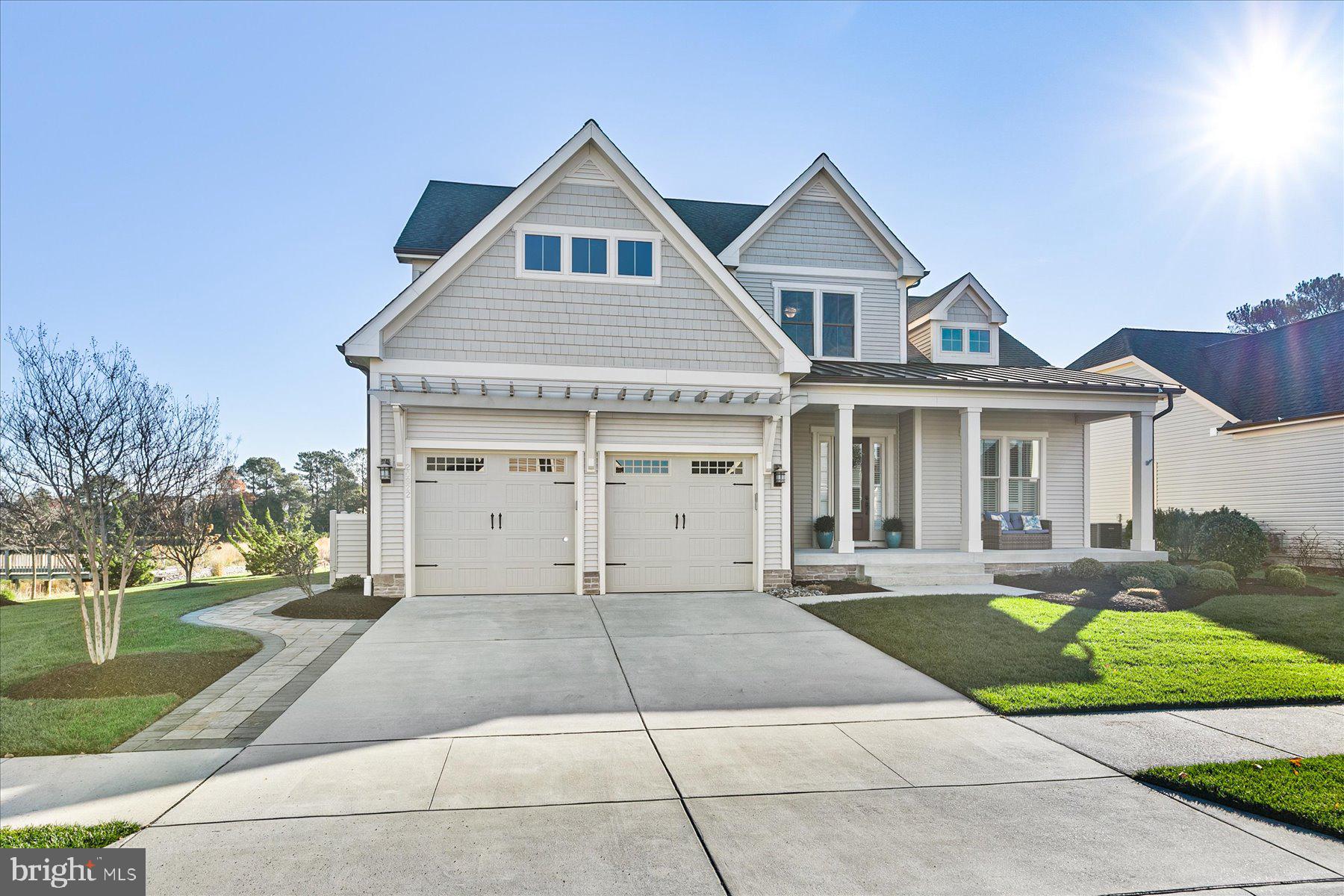 20822 Cormorant Way Ocean View, DE 19970 - Photo 2 of 91 front view of a house with a yard