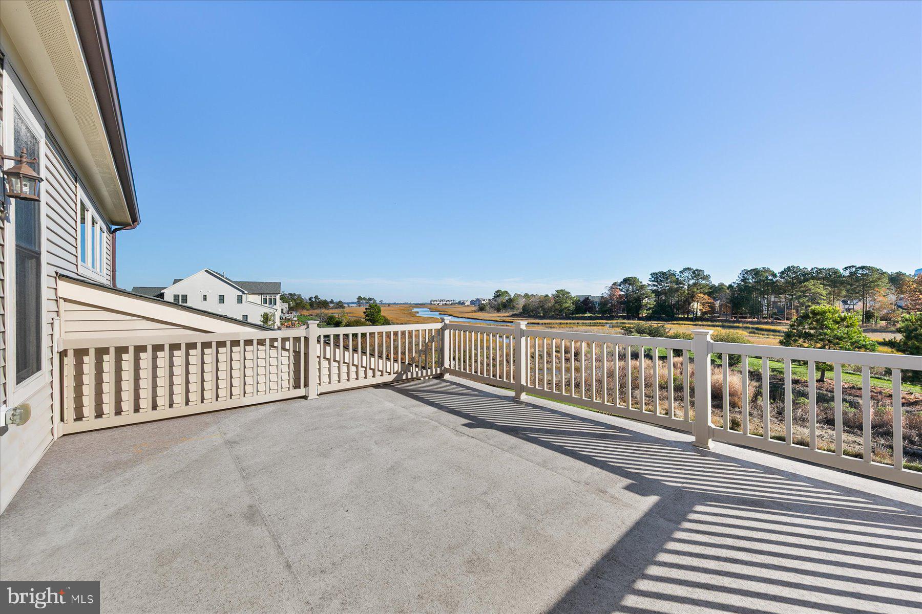 20822 Cormorant Way Ocean View, DE 19970 - Photo 50 of 91 a view of a balcony with wooden fence