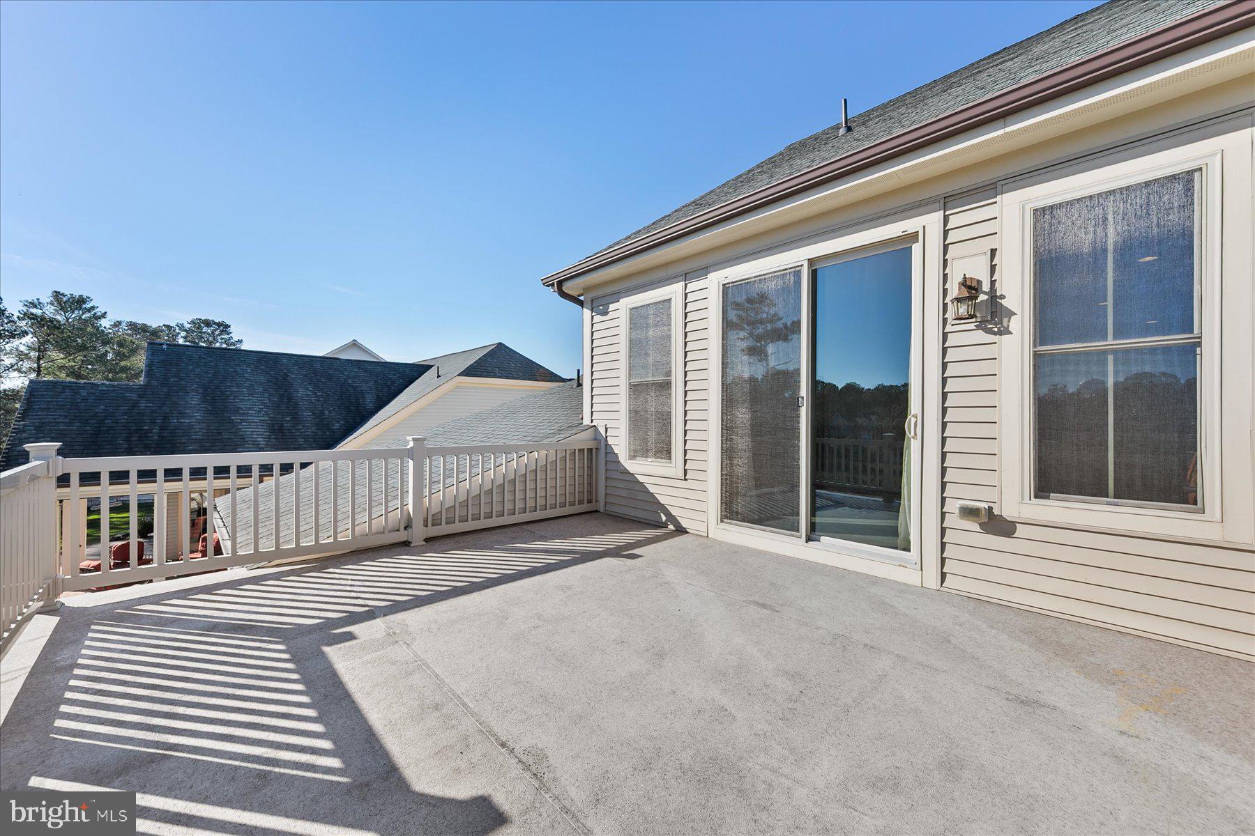 20822 Cormorant Way Ocean View, DE 19970 - Photo 51 of 91 a view of a house with a balcony