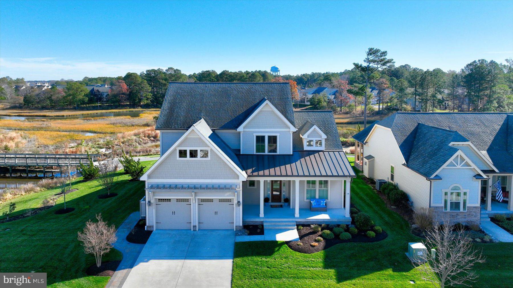 20822 Cormorant Way Ocean View, DE 19970 - Photo 62 of 91 a aerial view of a house with a big yard and potted plants