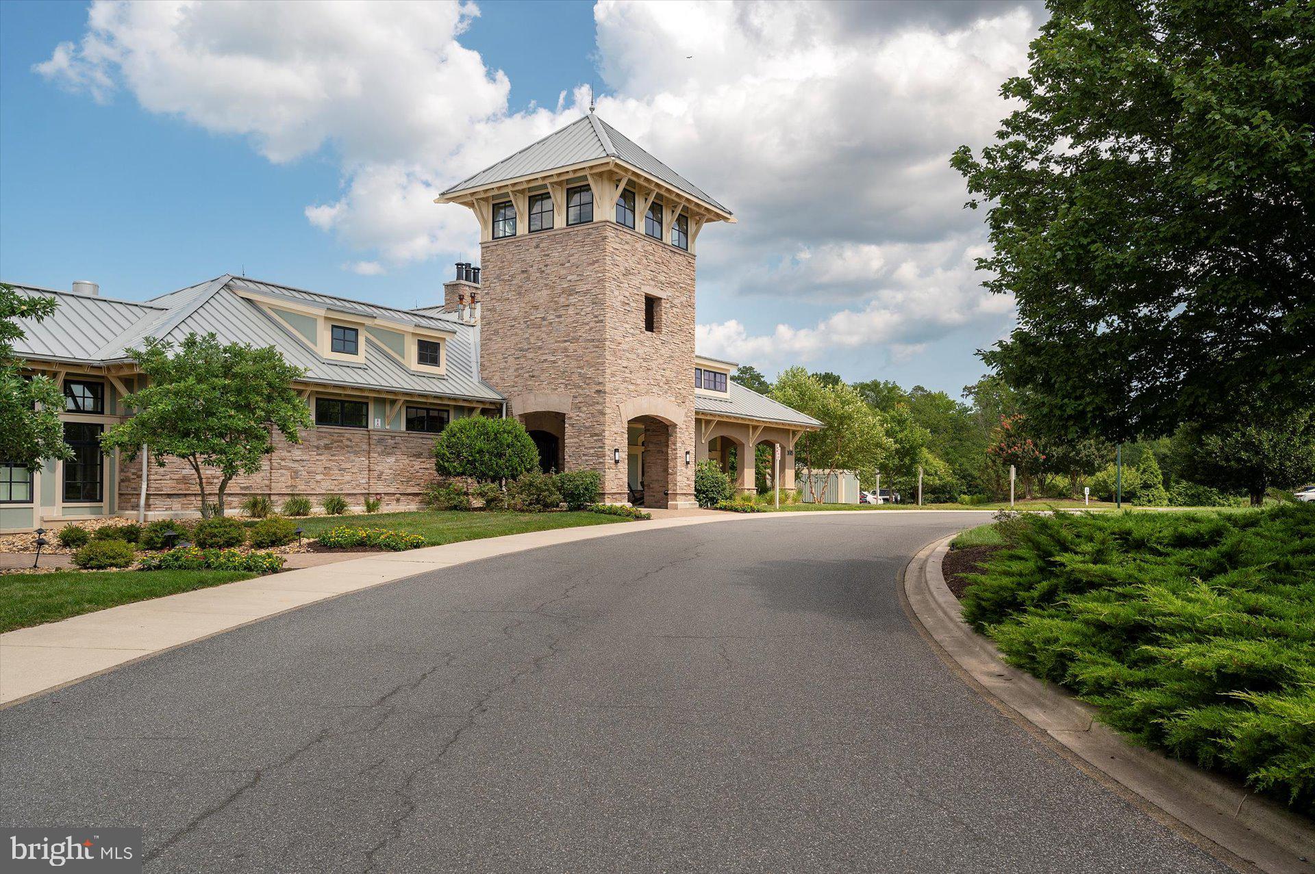 20822 Cormorant Way Ocean View, DE 19970 - Photo 76 of 91 a front view of a house with a yard and garage