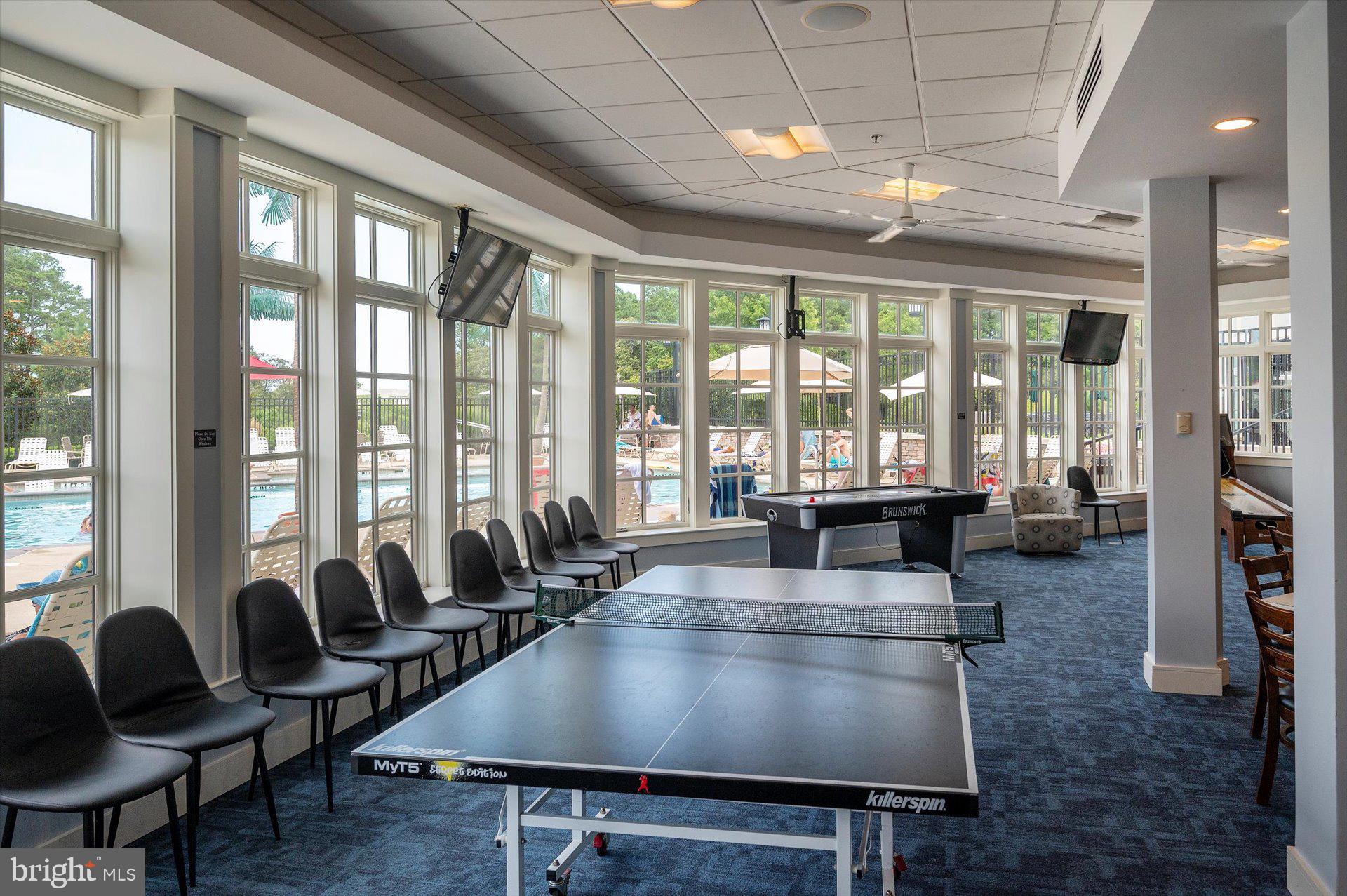 20822 Cormorant Way Ocean View, DE 19970 - Photo 83 of 91 a living room with furniture and floor to ceiling windows