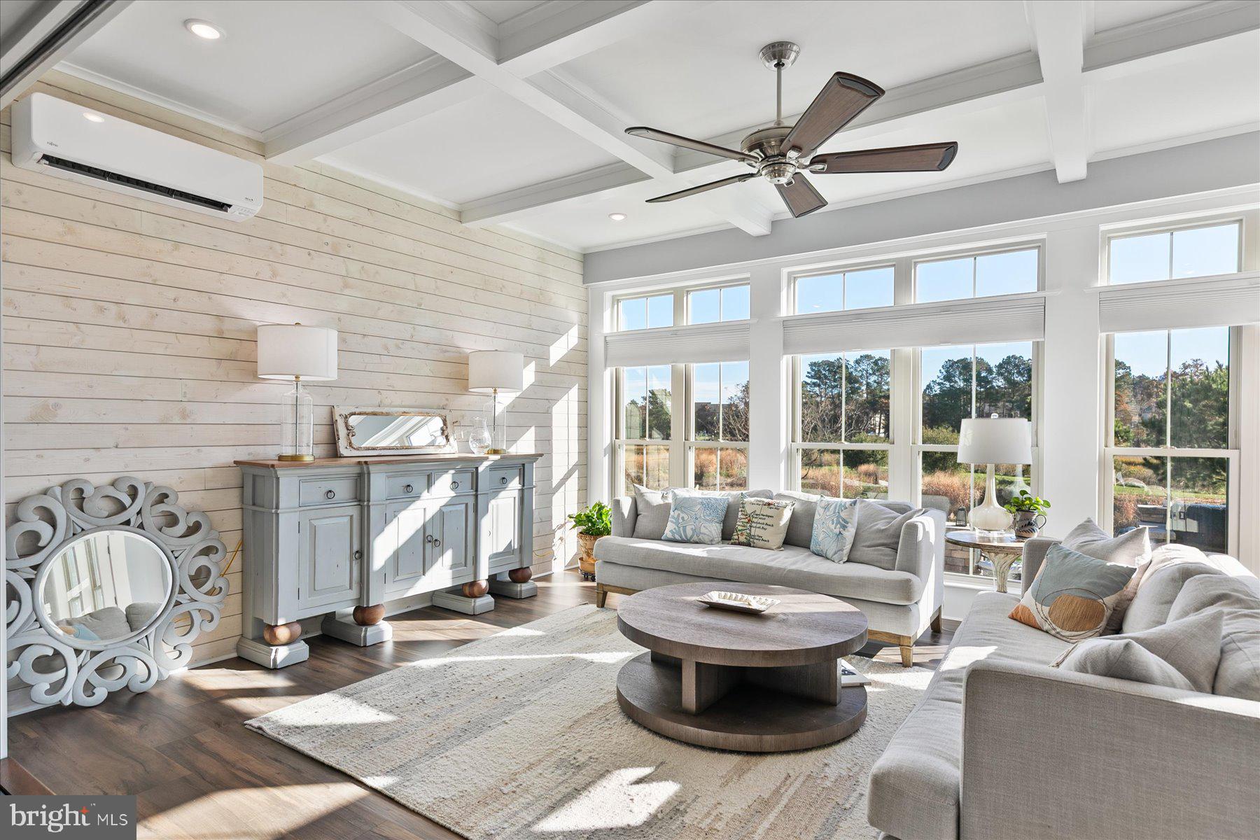 20822 Cormorant Way Ocean View, DE 19970 - Photo 9 of 91 a living room with patio furniture and a large window