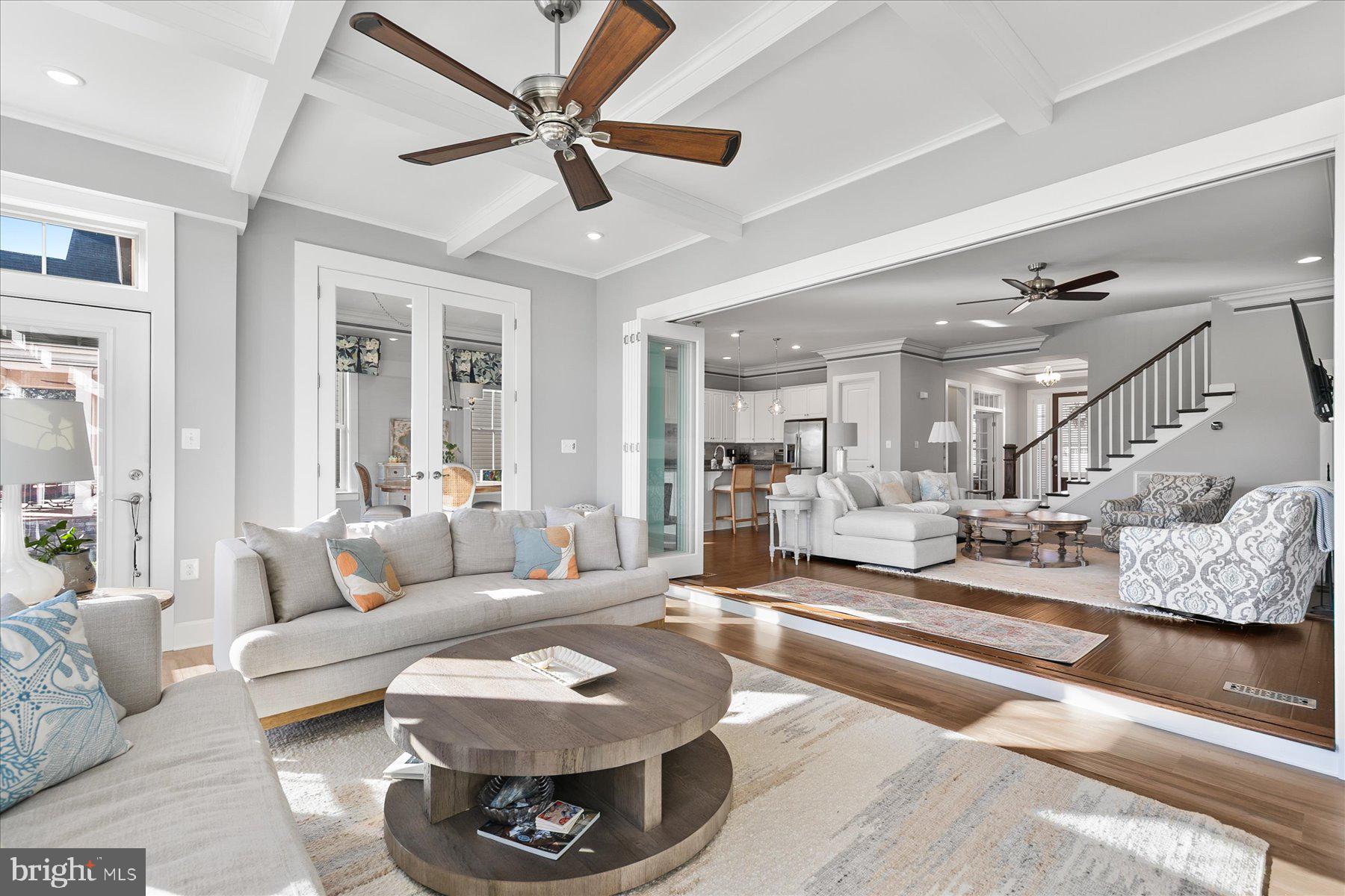 20822 Cormorant Way Ocean View, DE 19970 - Photo 10 of 91 a living room with furniture and a chandelier