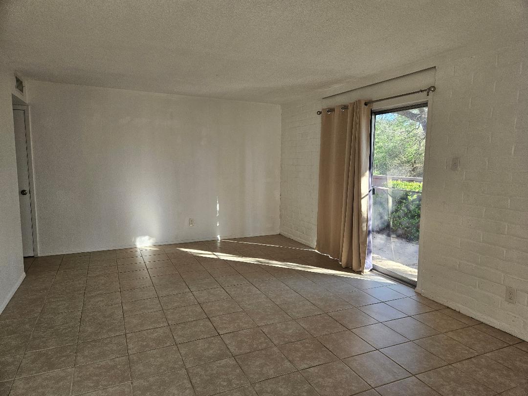 410 East 9th Street, Unit C Elgin, TX 78621 - Photo 2 of 11 a view of an empty room with a window