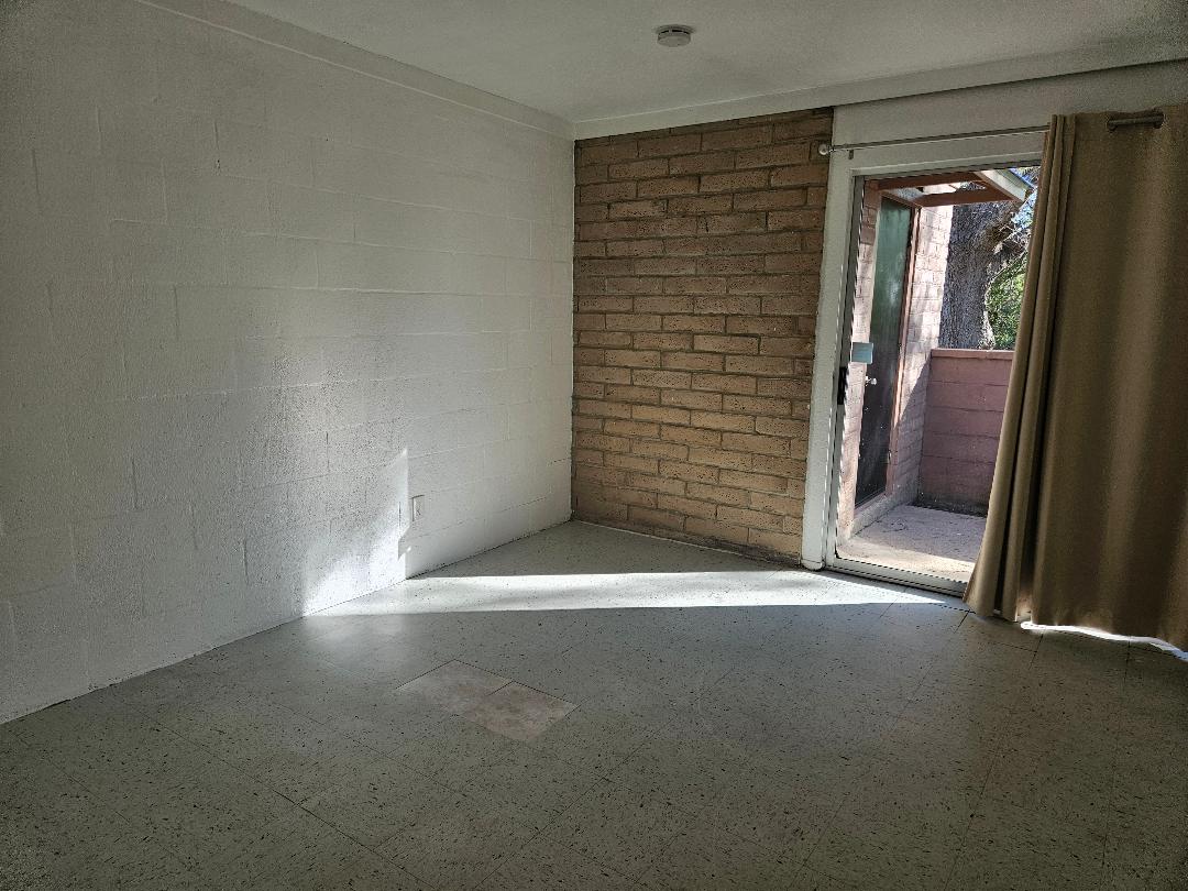 410 East 9th Street, Unit C Elgin, TX 78621 - Photo 6 of 11 a view of an empty room