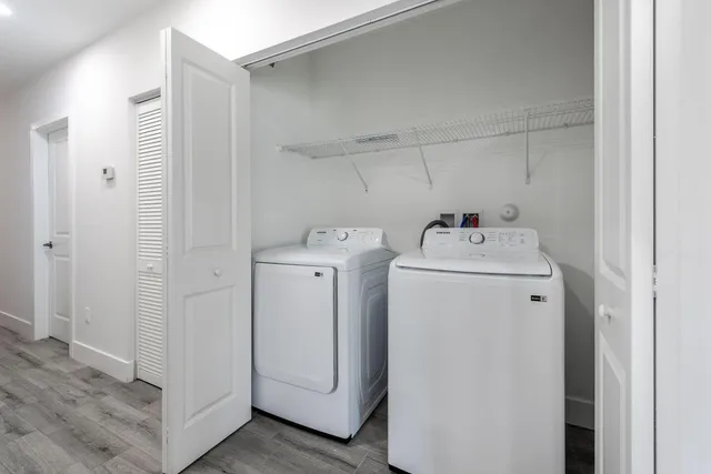 a utility room with dryer and washer