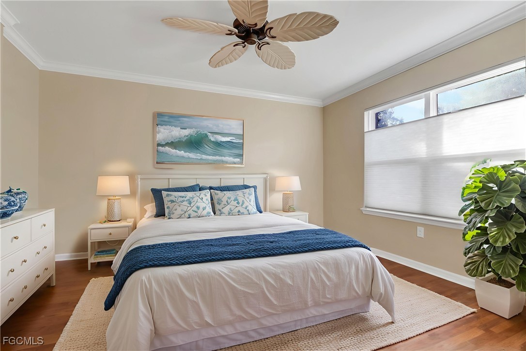 4210 Dutchess Park Road Fort Myers, FL 33916 - Photo 11 of 36 a bedroom with a bed and a potted plant