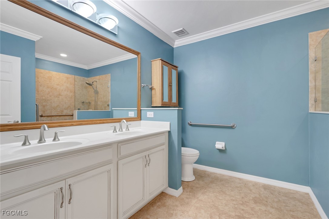 4210 Dutchess Park Road Fort Myers, FL 33916 - Photo 13 of 36 a bathroom with a granite countertop sink and a mirror
