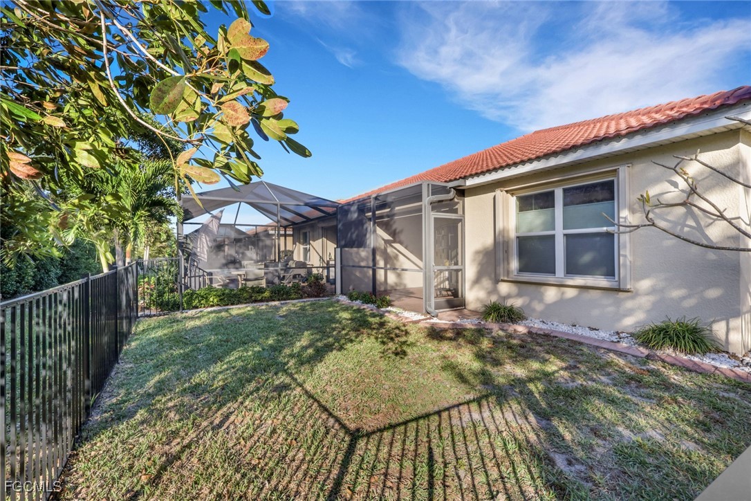 4210 Dutchess Park Road Fort Myers, FL 33916 - Photo 21 of 36 a view of a house with a yard