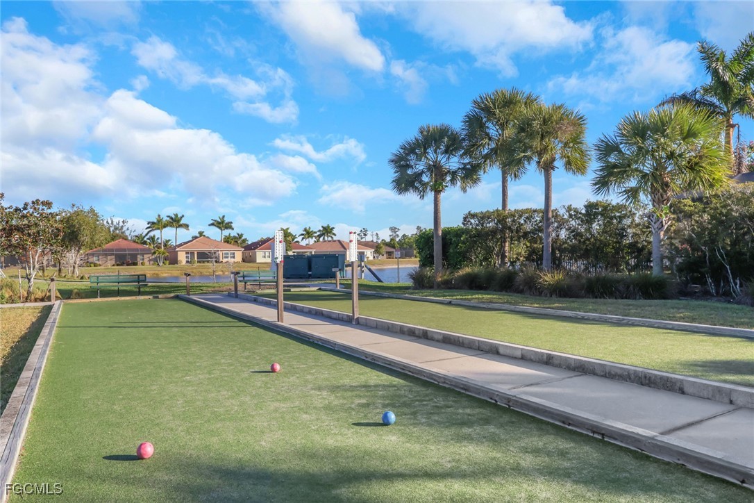 4210 Dutchess Park Road Fort Myers, FL 33916 - Photo 27 of 36 a view of a swimming pool and a yard