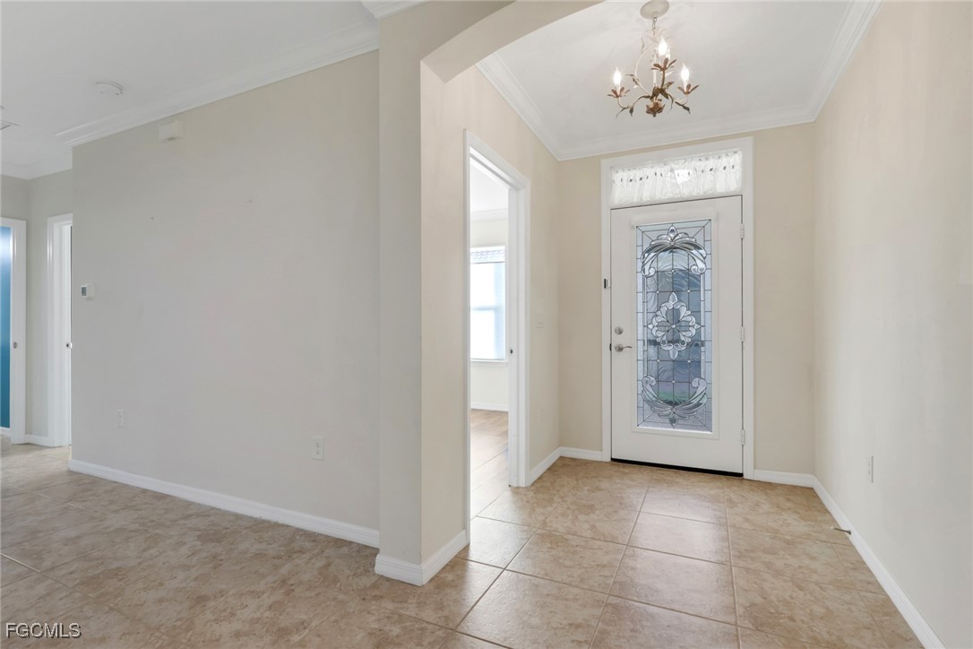 4210 Dutchess Park Road Fort Myers, FL 33916 - Photo 5 of 36 a view of an empty room with a window
