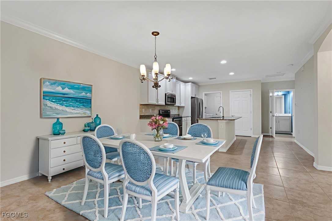 4210 Dutchess Park Road Fort Myers, FL 33916 - Photo 6 of 36 a view of a dining room with furniture