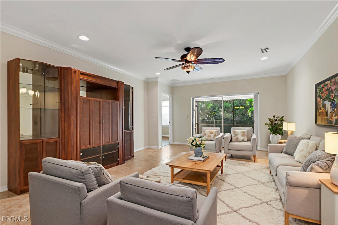 4210 Dutchess Park Road Fort Myers, FL 33916 - Photo 9 of 36 a living room with furniture and a large window
