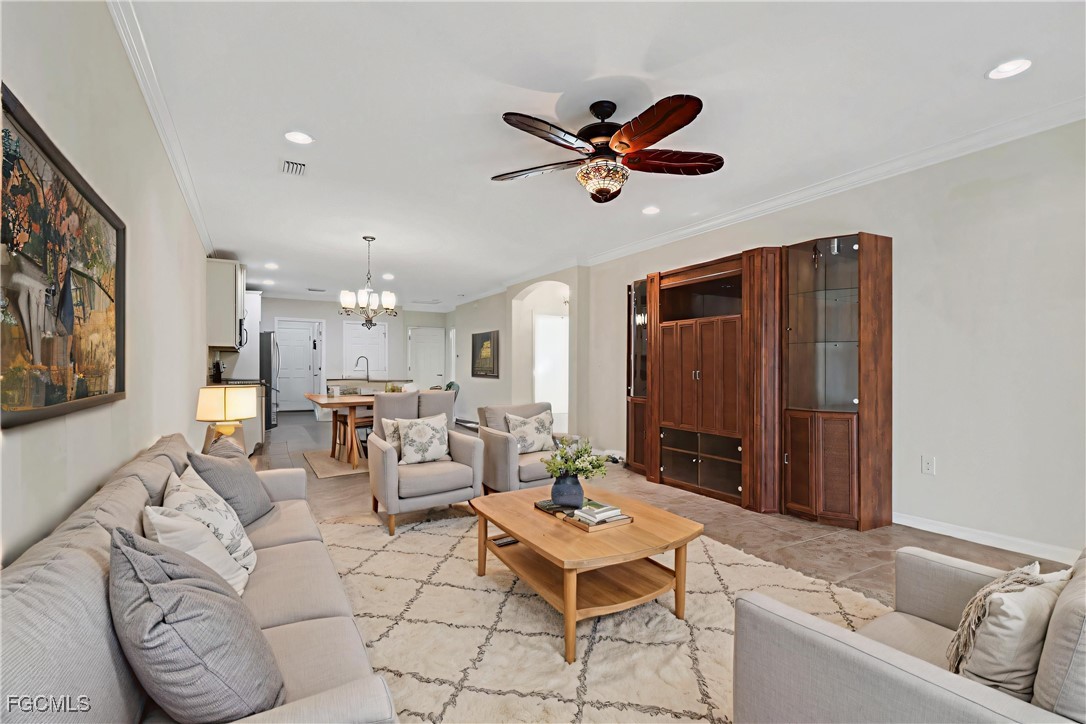 4210 Dutchess Park Road Fort Myers, FL 33916 - Photo 10 of 36 a living room with furniture and a window