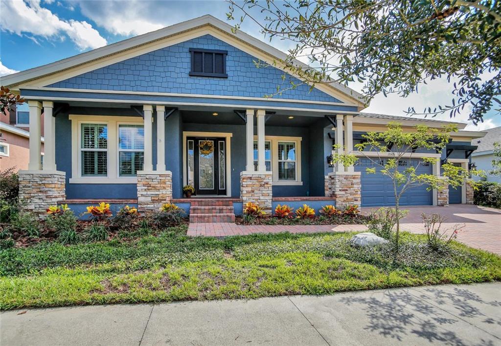 15505 Mossy Ridge Lane Lithia, FL 33547 - Photo 1 of 1 a front view of a house with a yard