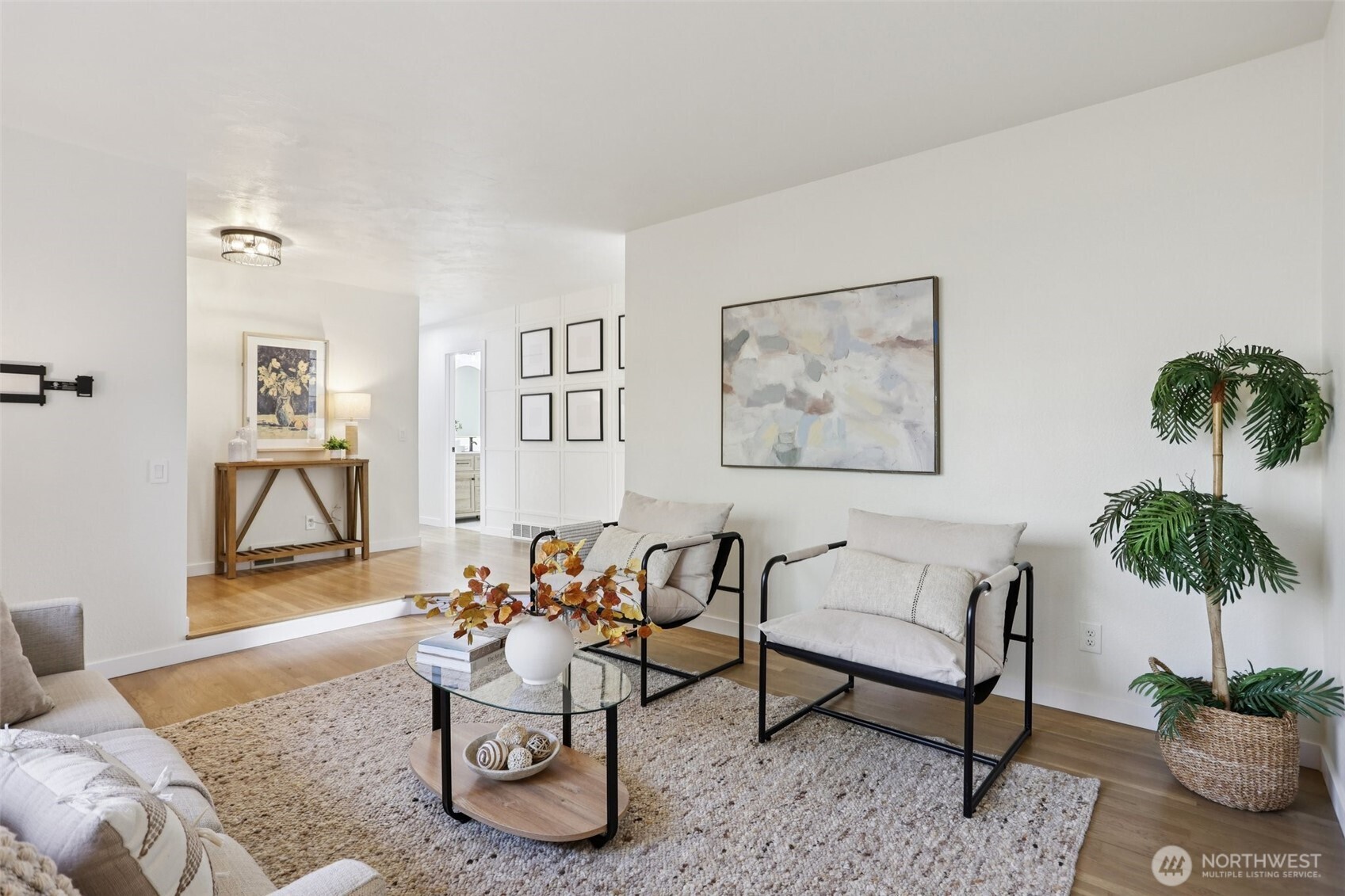 9002 34th Avenue Southwest Seattle, WA 98126 - Photo 14 of 39 a living room with furniture and a potted plant