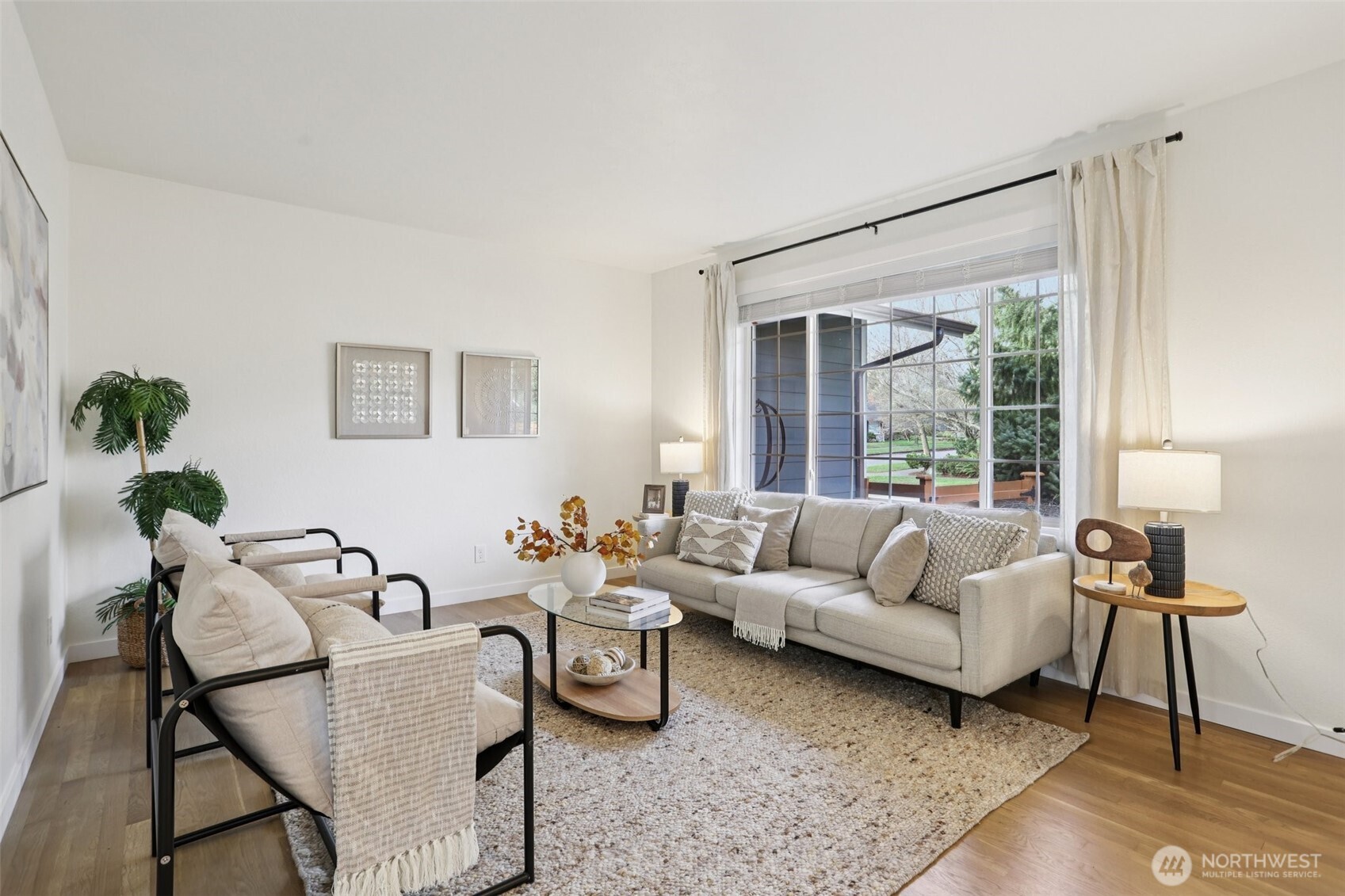 9002 34th Avenue Southwest Seattle, WA 98126 - Photo 15 of 39 a living room with furniture and a large window