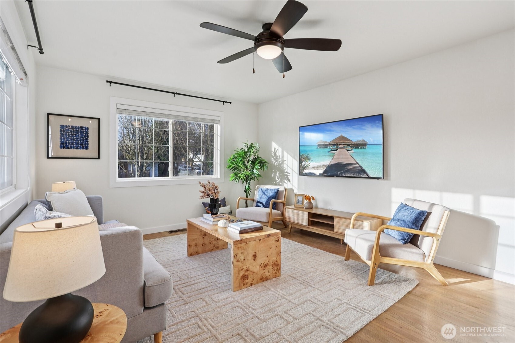 9002 34th Avenue Southwest Seattle, WA 98126 - Photo 18 of 39 a living room with furniture and a large window