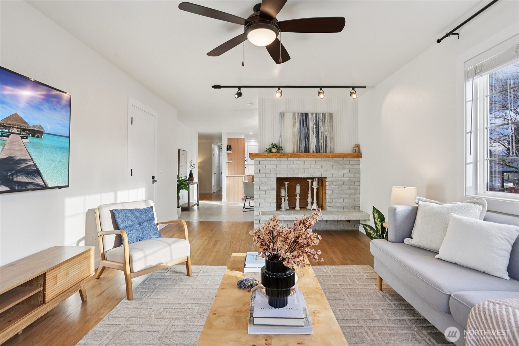 9002 34th Avenue Southwest Seattle, WA 98126 - Photo 19 of 39 a living room with furniture and a fireplace