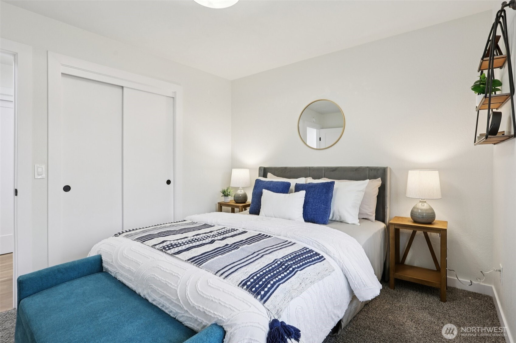 9002 34th Avenue Southwest Seattle, WA 98126 - Photo 22 of 39 a bedroom with a bed and a window
