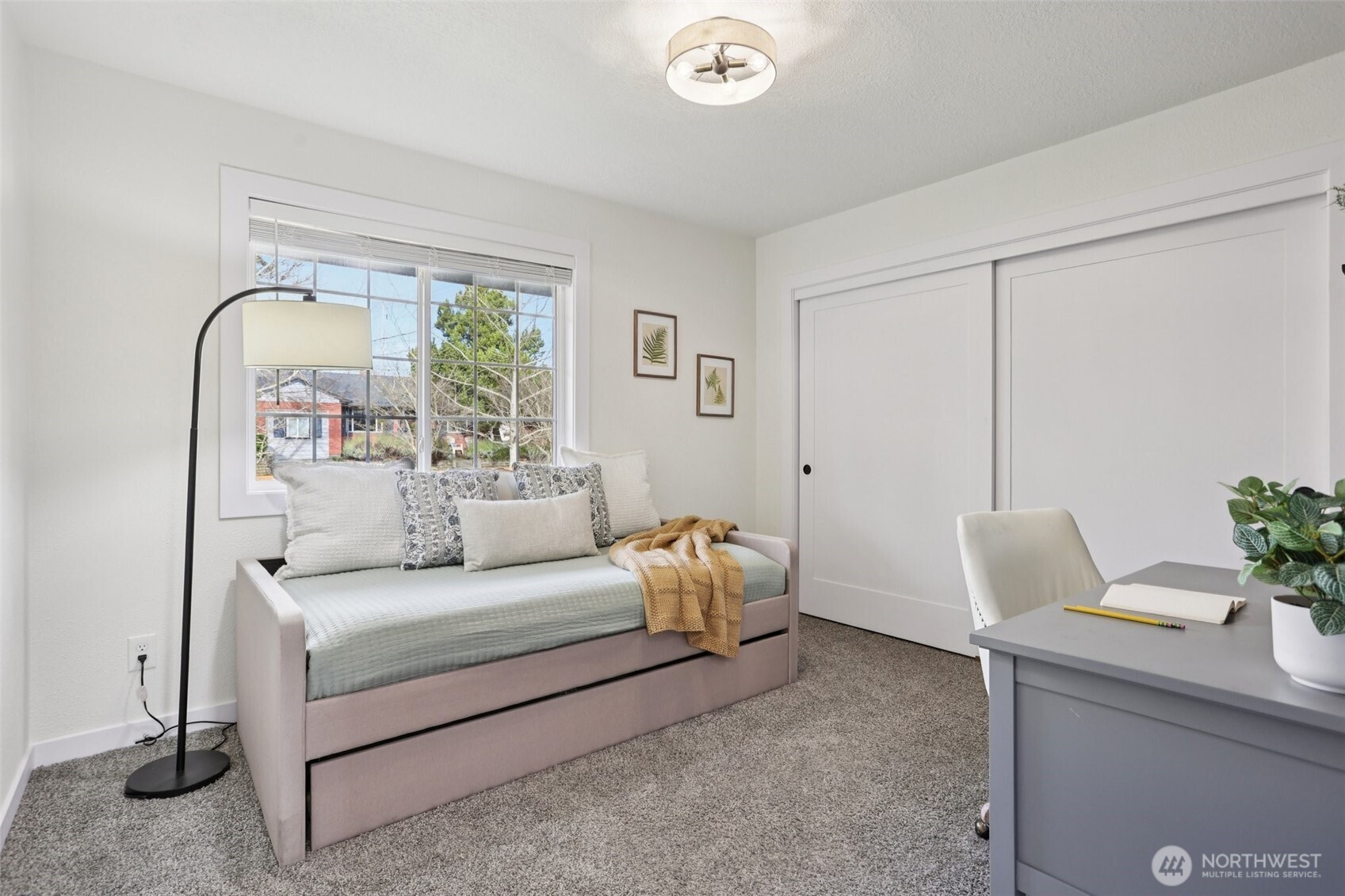 9002 34th Avenue Southwest Seattle, WA 98126 - Photo 25 of 39 a living room with furniture and a large window