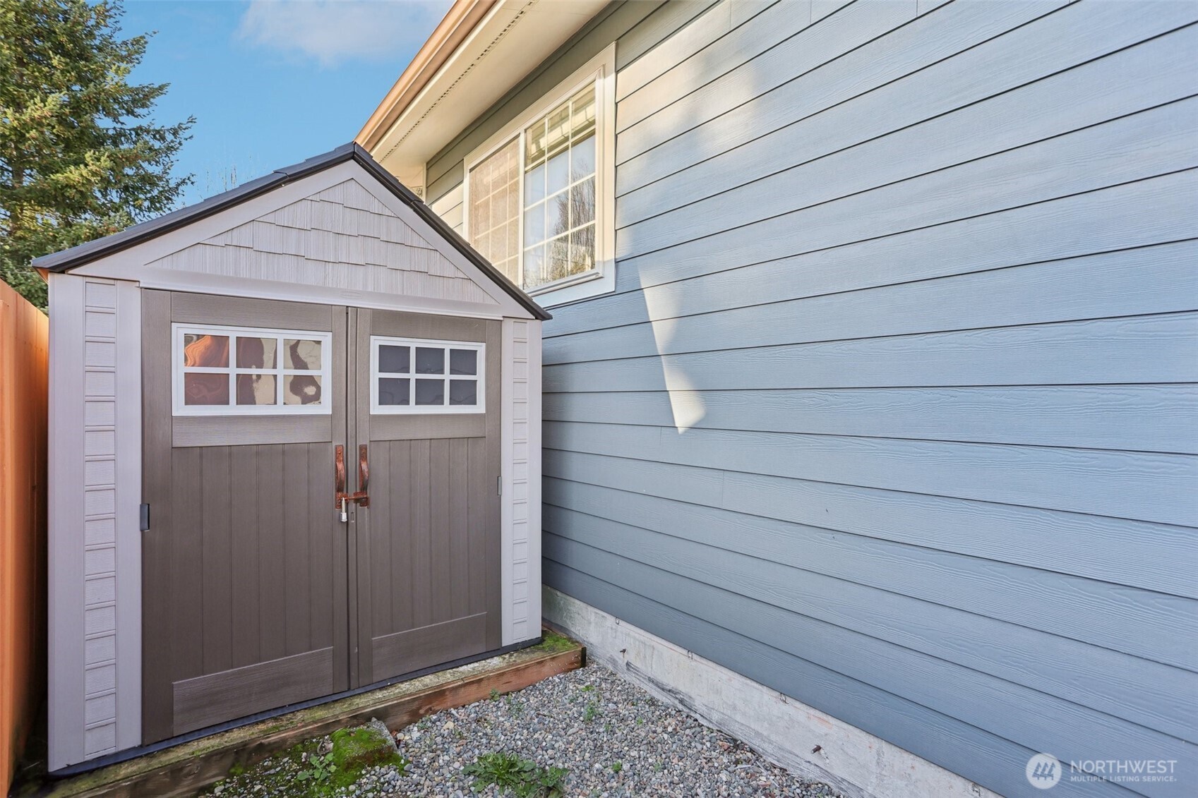 9002 34th Avenue Southwest Seattle, WA 98126 - Photo 30 of 39 a view of a small house