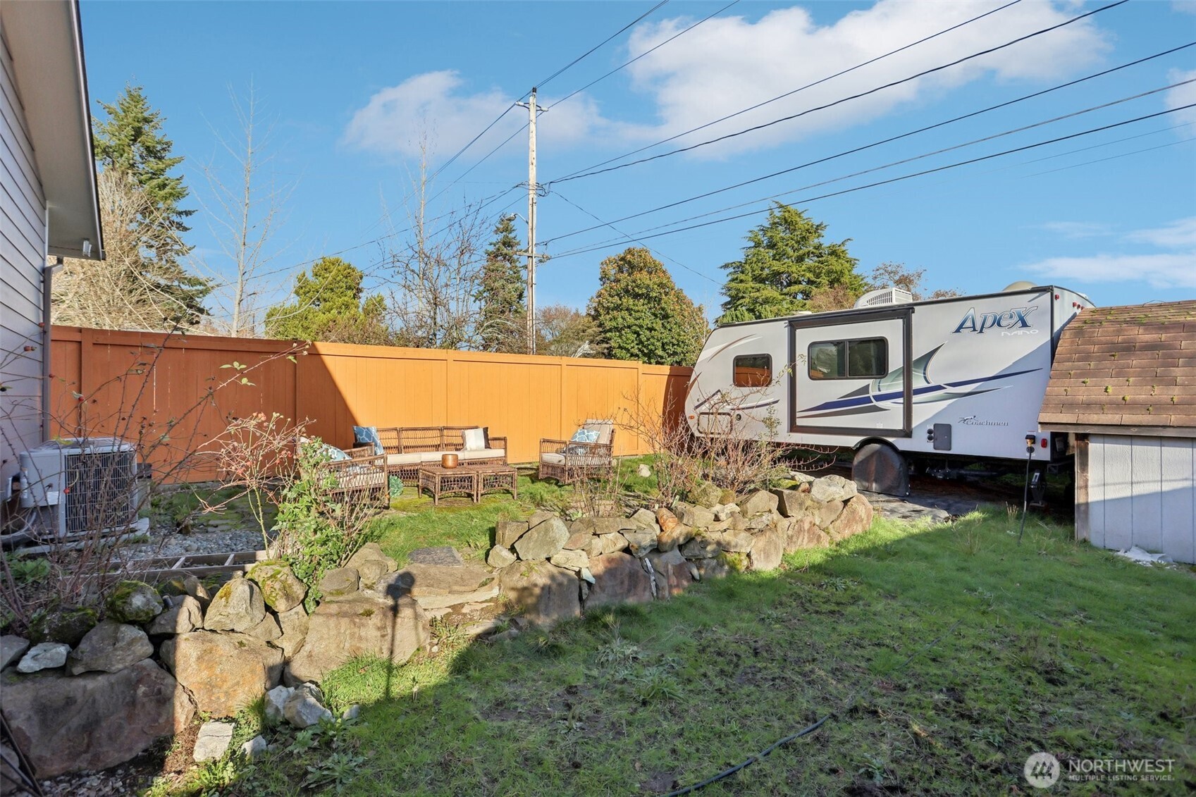 9002 34th Avenue Southwest Seattle, WA 98126 - Photo 33 of 39 a view of a house with a yard