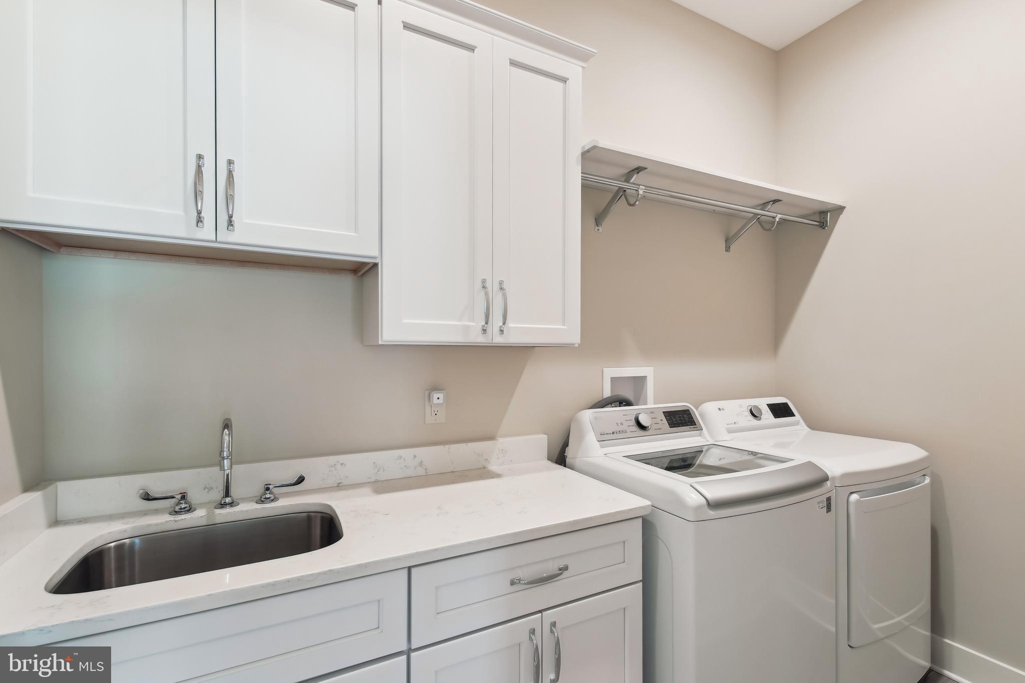 32871 Widgeon Road, Unit 15 Ocean View, DE 19970 - Photo 22 of 91 Laundry room w/sink