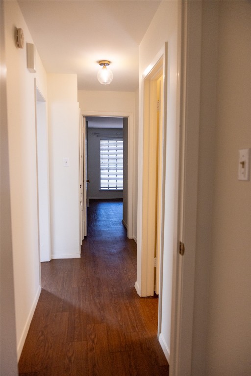 4205 Steve Scarbrough Drive Austin, TX 78759 - Photo 22 of 25 a view of a hallway with wooden floor