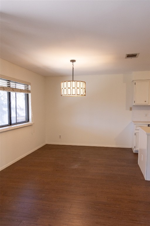 4205 Steve Scarbrough Drive Austin, TX 78759 - Photo 5 of 25 wooden floor in an empty room with a window