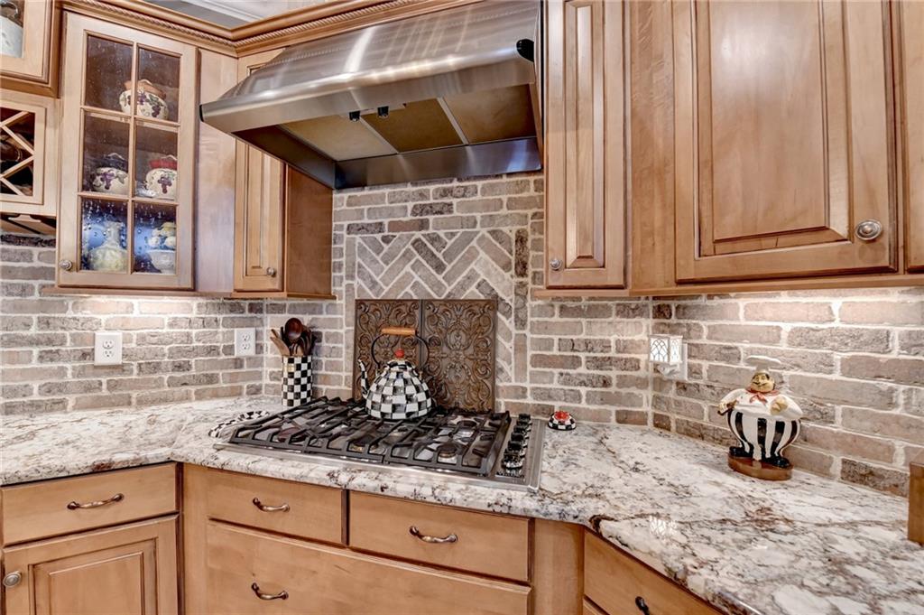 2850 Roanoke Road Cumming, GA 30041 - Photo 48 of 91 a kitchen with granite countertop stainless steel appliances sink and cabinets