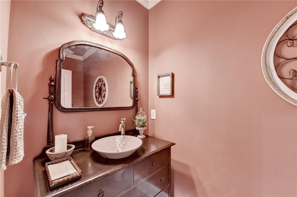 2850 Roanoke Road Cumming, GA 30041 - Photo 58 of 91 a bathroom with a toilet and a sink