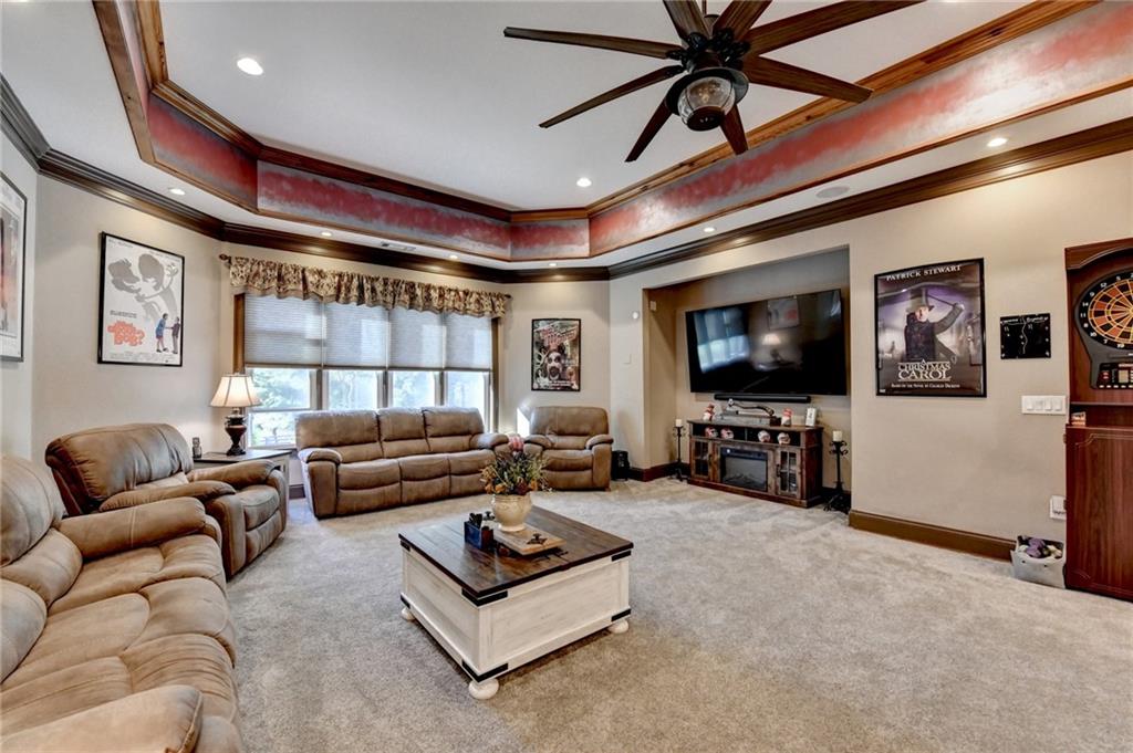 2850 Roanoke Road Cumming, GA 30041 - Photo 73 of 91 a living room with furniture and a flat screen tv