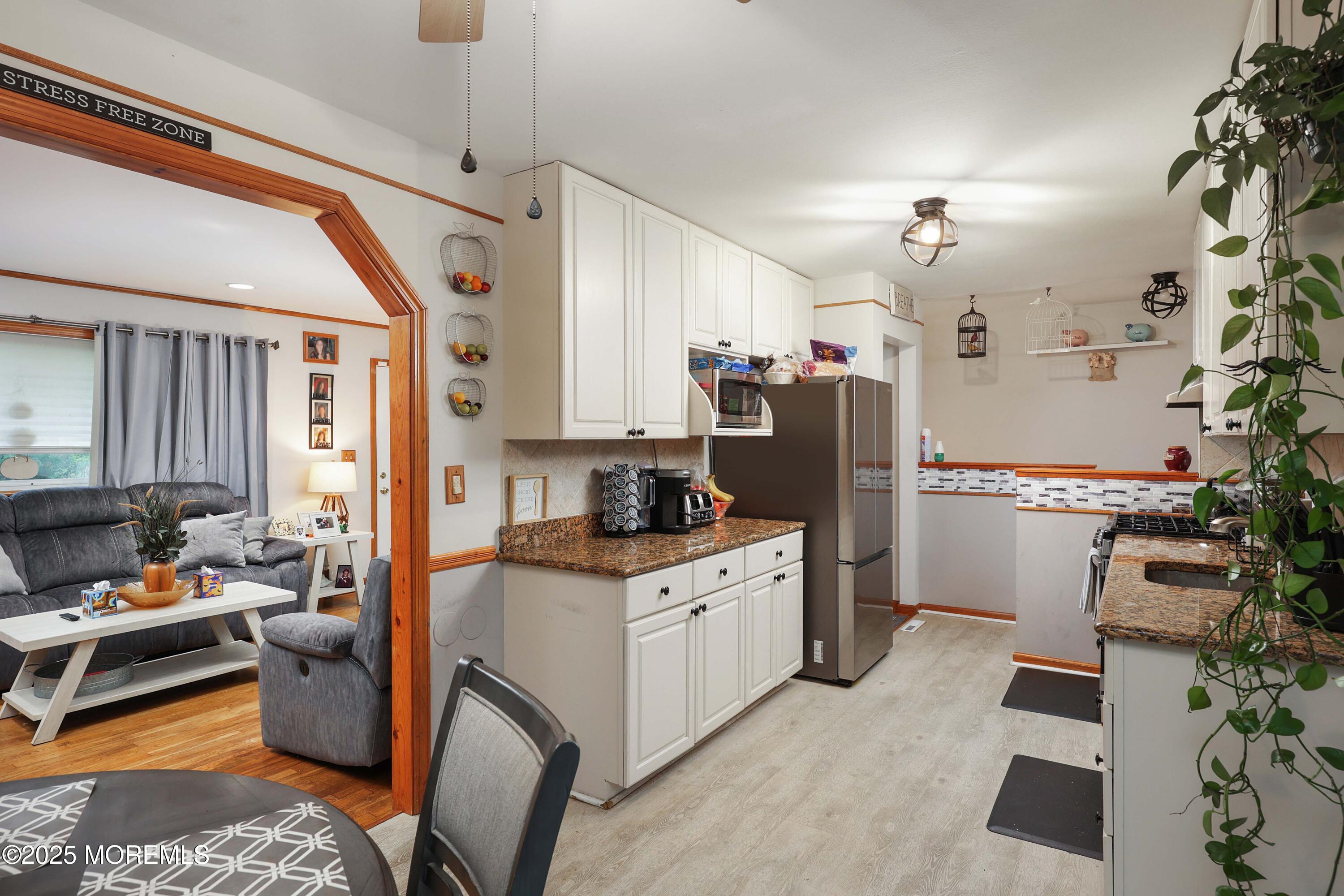 51 Alan Terrace Howell, NJ 07731 - Photo 12 of 32 a kitchen with a sink appliances and cabinets