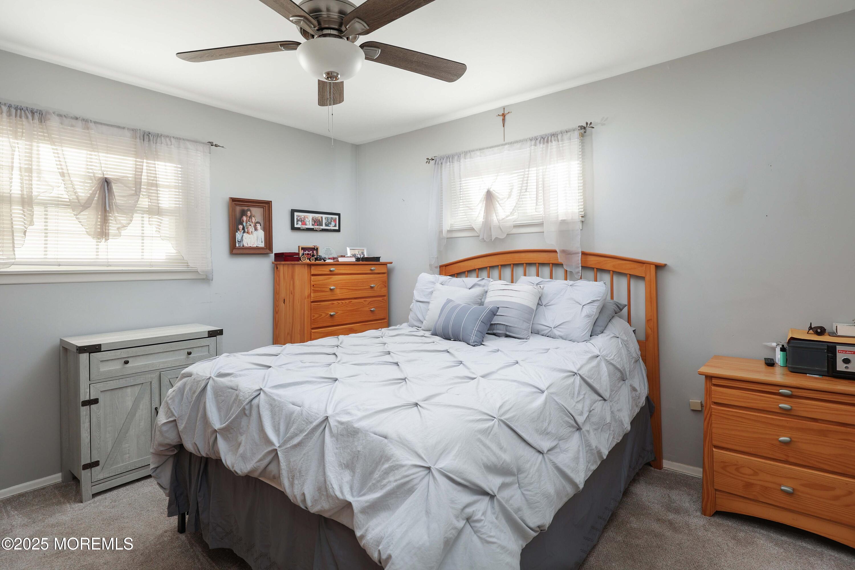 51 Alan Terrace Howell, NJ 07731 - Photo 15 of 32 a bedroom with a bed and a window