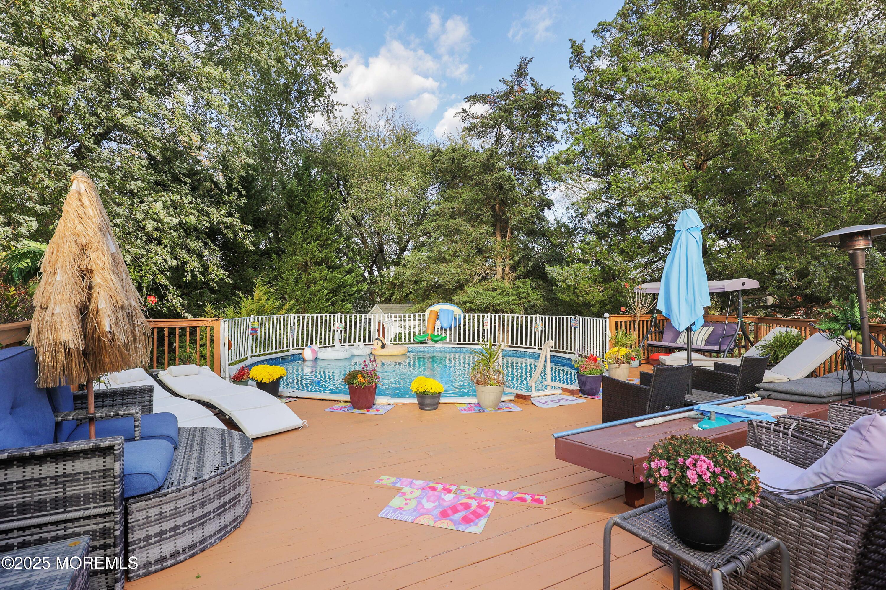 51 Alan Terrace Howell, NJ 07731 - Photo 23 of 32 a view of a swimming pool with a patio