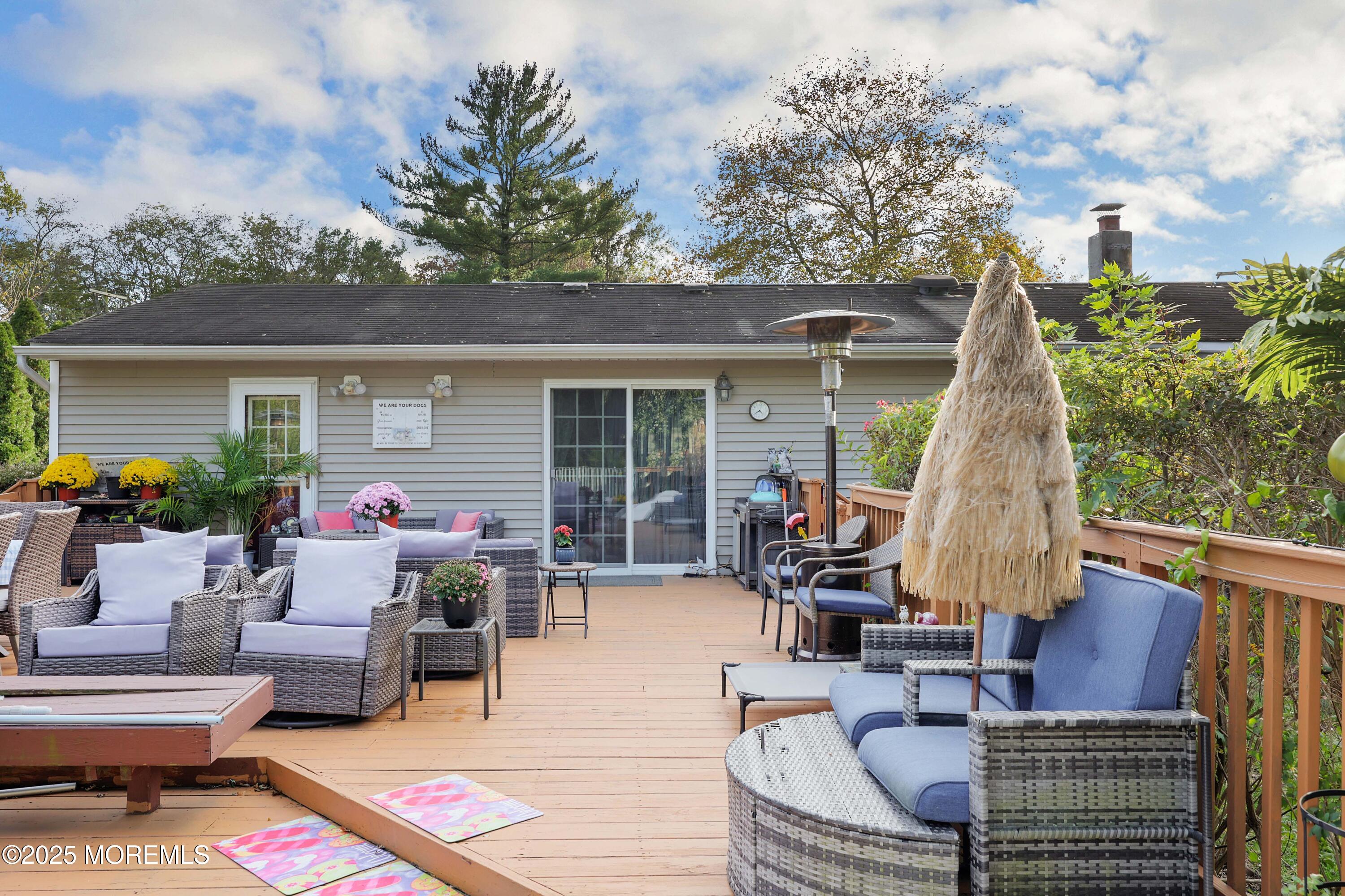 51 Alan Terrace Howell, NJ 07731 - Photo 24 of 32 a view of a dinning table and chairs in the patio