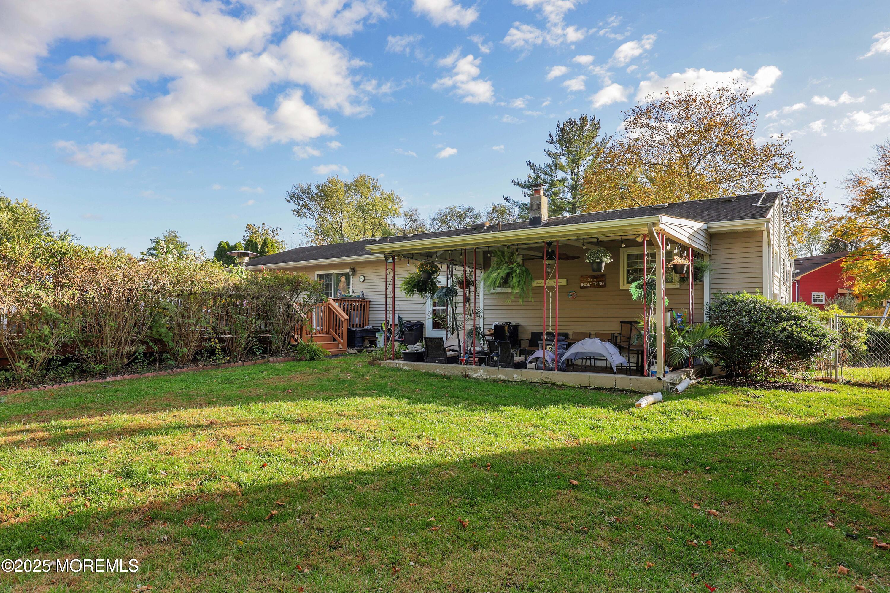51 Alan Terrace Howell, NJ 07731 - Photo 25 of 32 a view of a house with swimming pool and garden