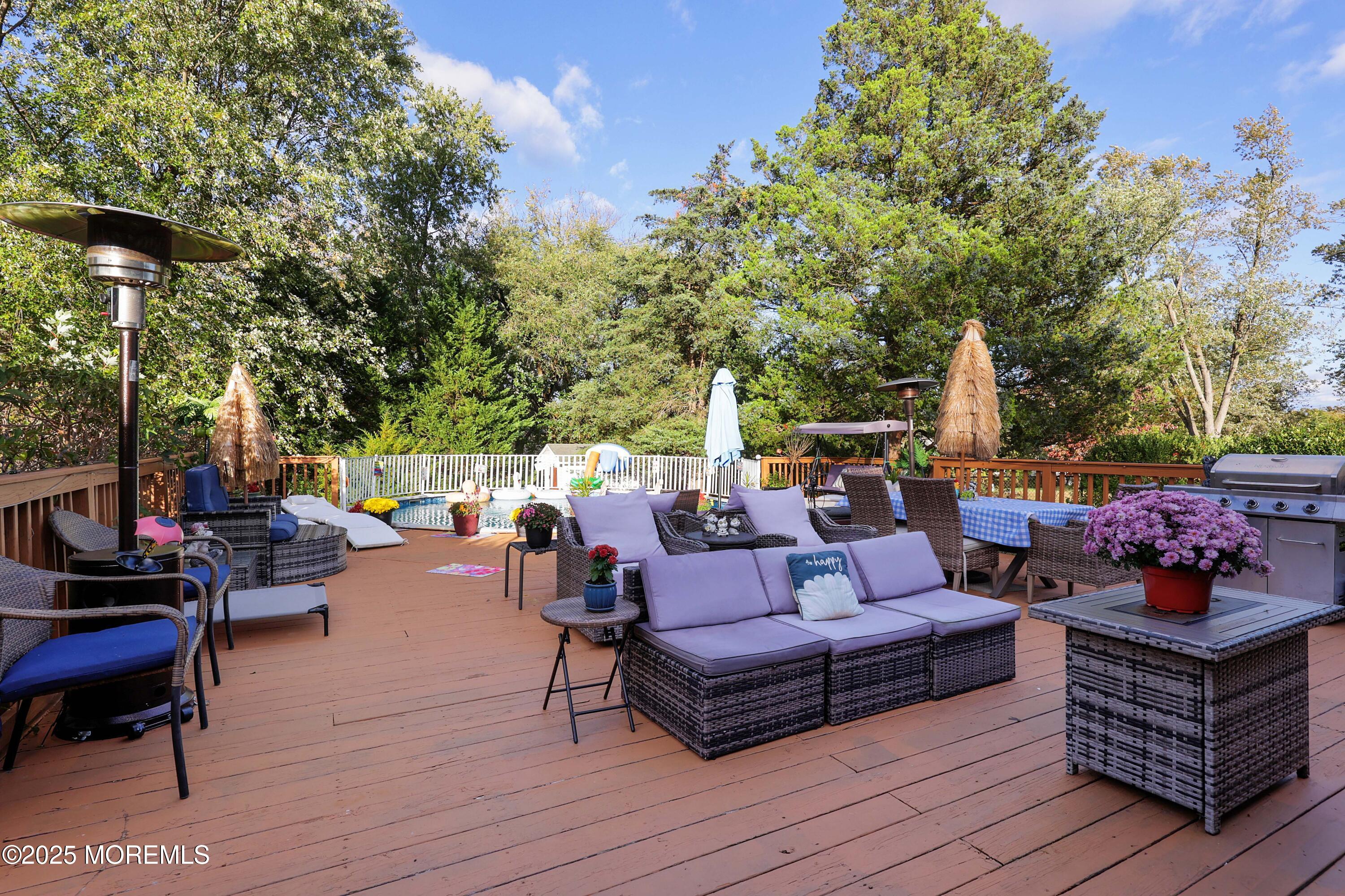 51 Alan Terrace Howell, NJ 07731 - Photo 26 of 32 a outdoor living space with furniture and garden view