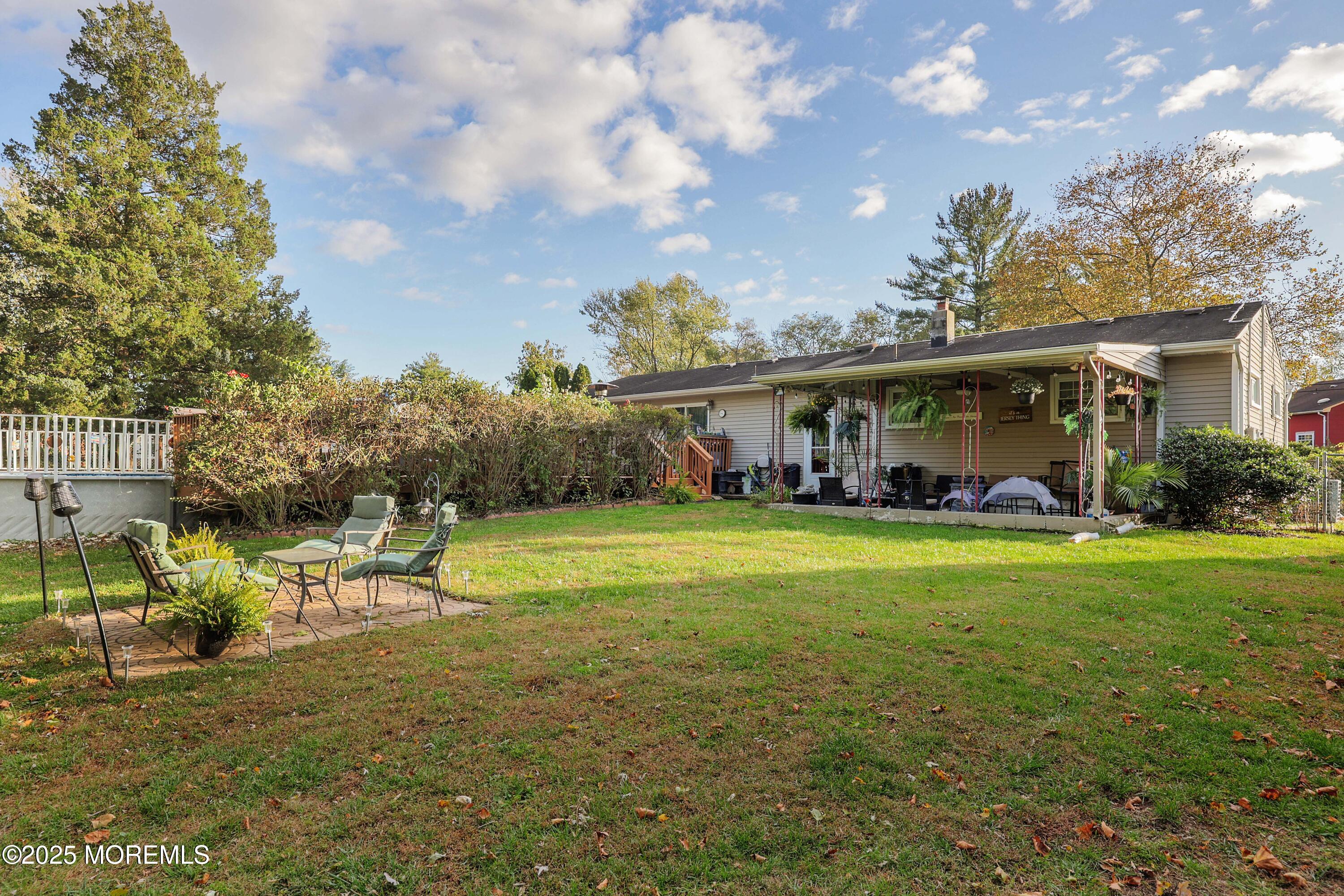 51 Alan Terrace Howell, NJ 07731 - Photo 28 of 32 a view of a house with a big yard