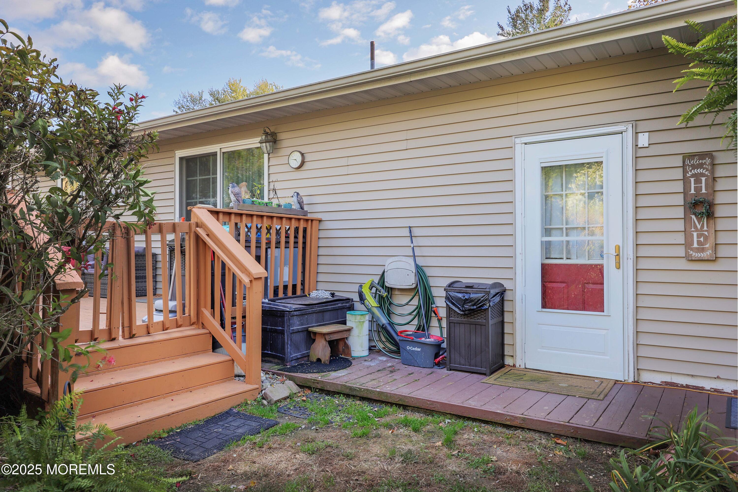 51 Alan Terrace Howell, NJ 07731 - Photo 29 of 32 a view of a house with backyard and sitting area