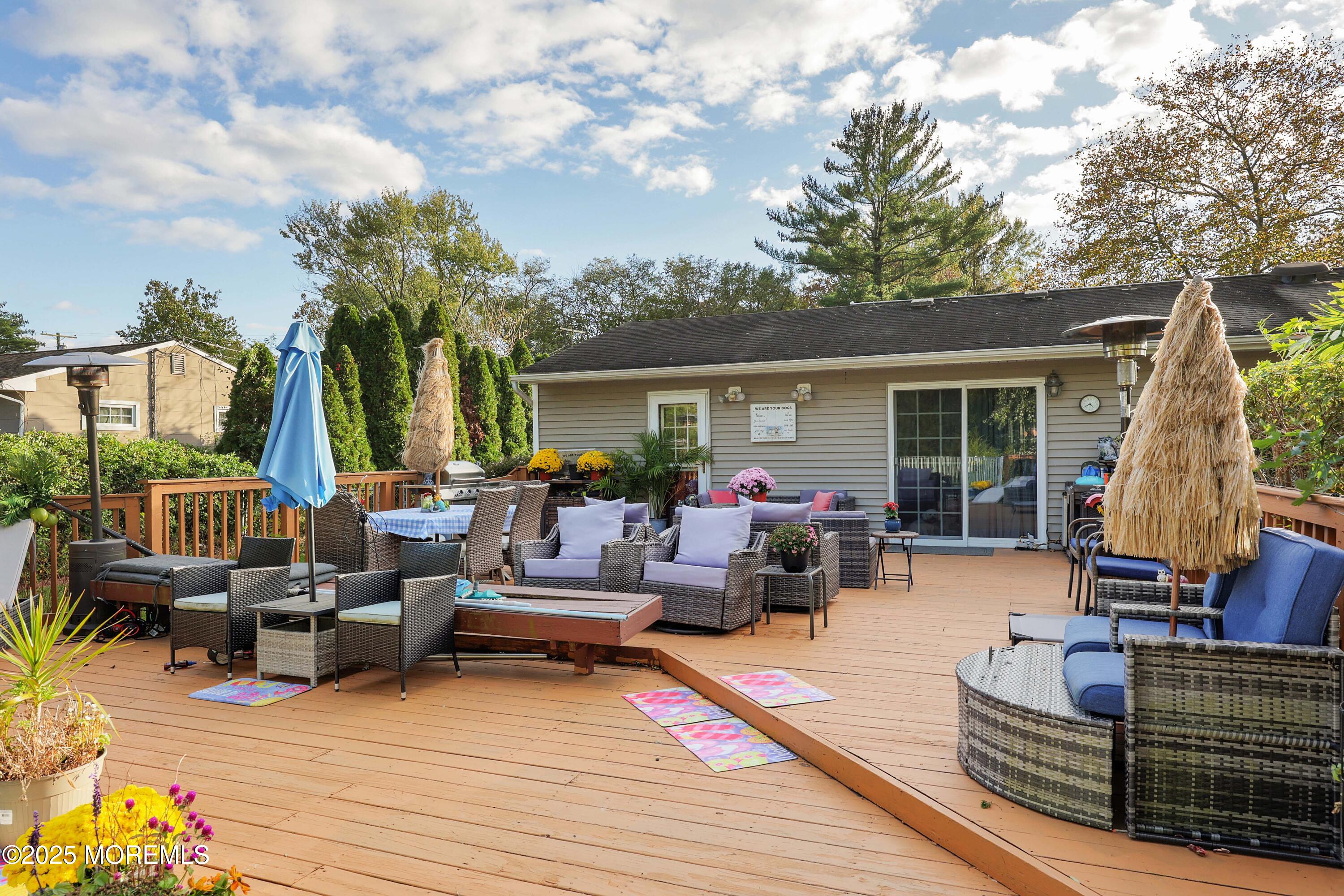 51 Alan Terrace Howell, NJ 07731 - Photo 7 of 32 a view of house with patio and a garden